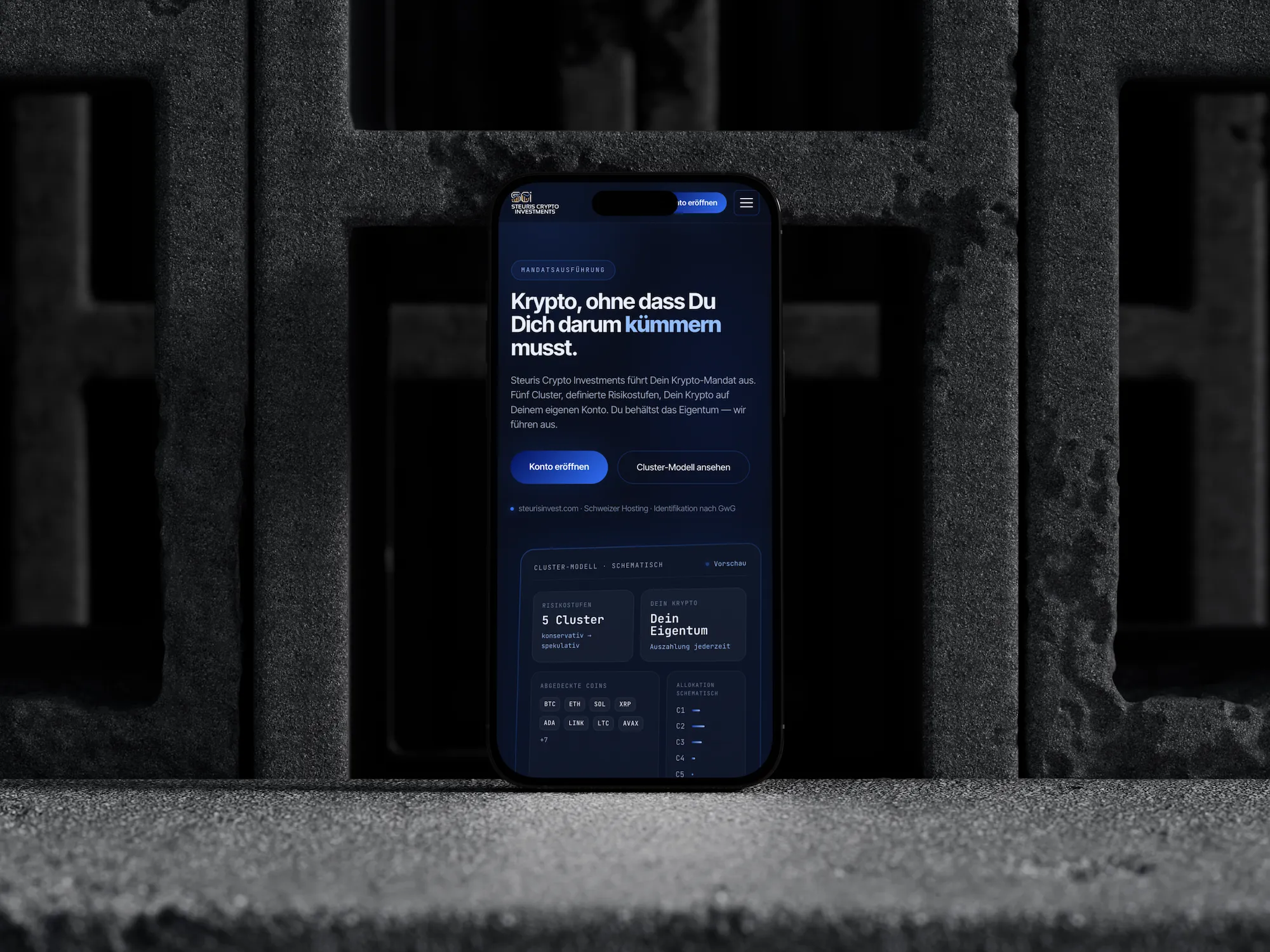 The Steuris Crypto Investments home page on an iPhone, standing against concrete blocks