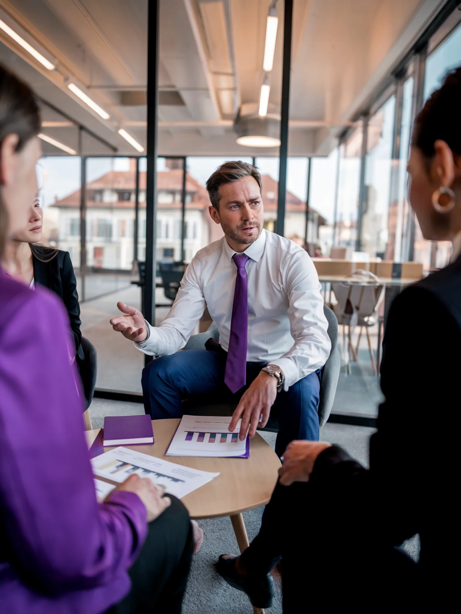 AI-generated business image: businessman with violet tie in consultation, Swiss city through glass facade